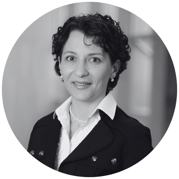 Headshot of Dr Dronca in black and white